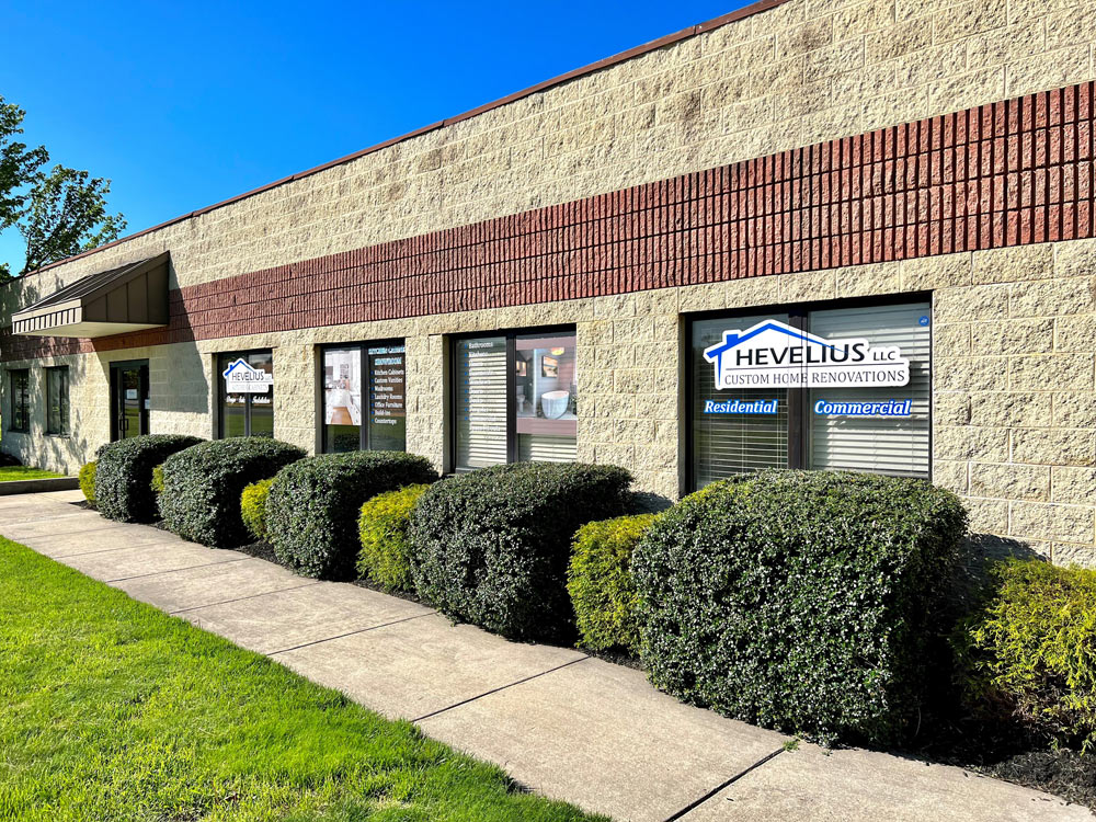 Hevelius Custom Renovations storefront with landscaped bushes
